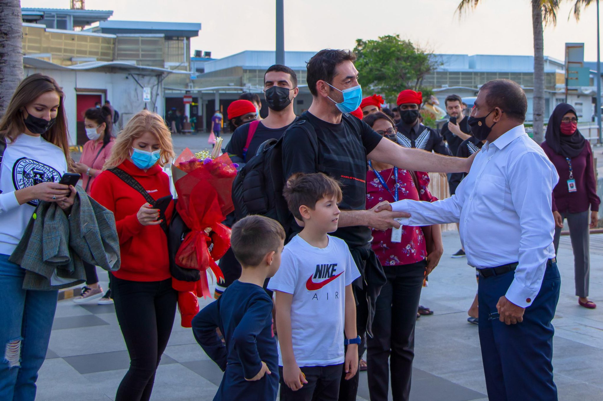 Tourism minister Abdulla Mausoom receiving Tourists.