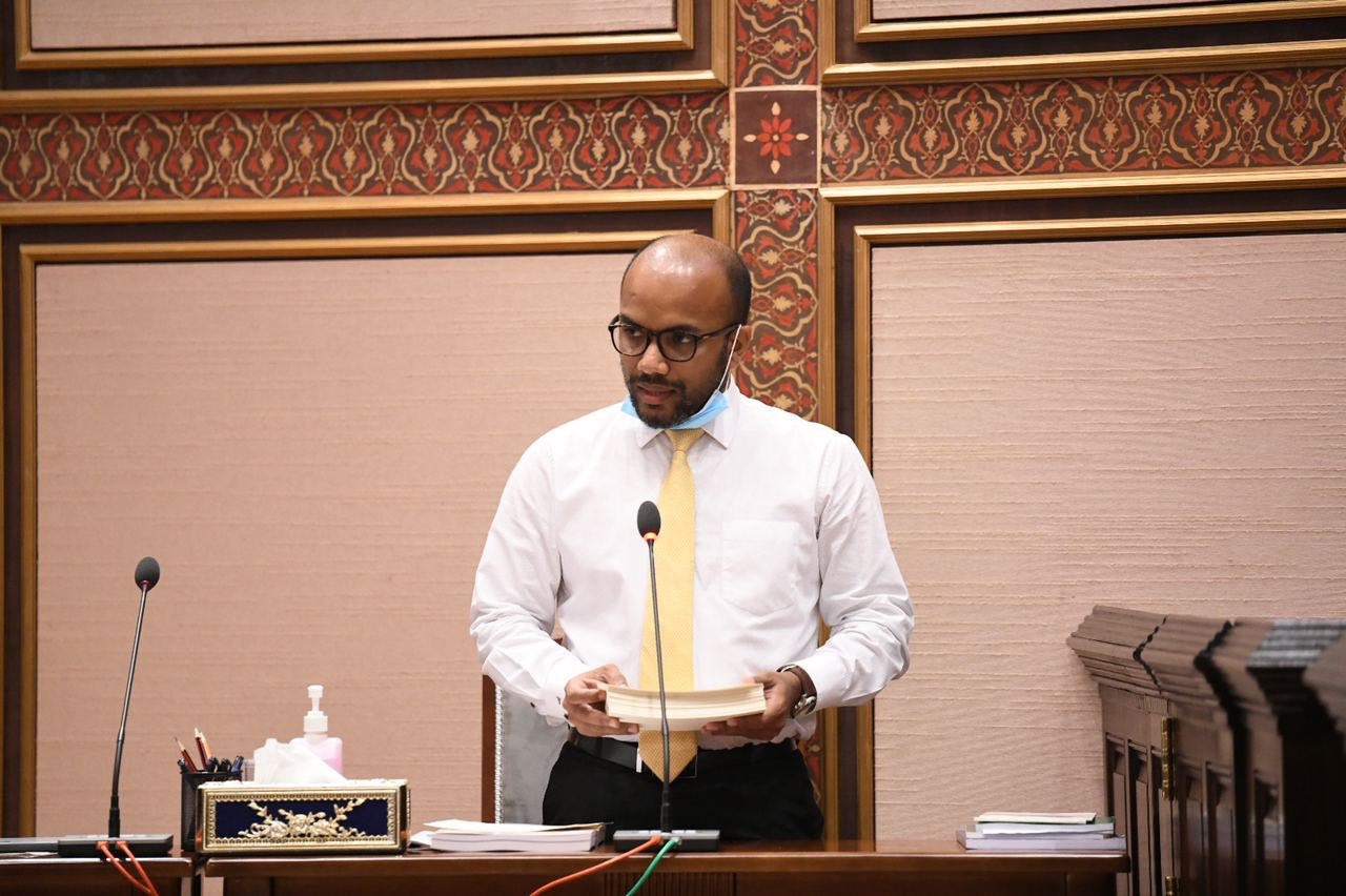 Minister of Finance Ibrahim Ameer presenting the proposed budget for 2021 at the Parliament.