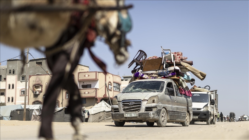 Residents are seen leaving to flee the Amal neighborhood in Khan Yunis after the Israeli army issued urgent evacuation warnings ahead of a possible Israeli attacks on Gaza on June 04, 2025.