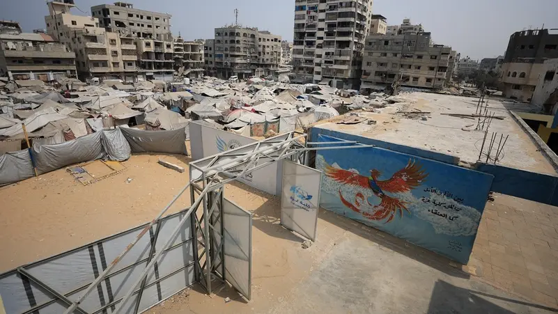 Palestinians, displaced by the Israeli offensive, shelter in tents, in Gaza City, on August 12, 2025. (Reuters)