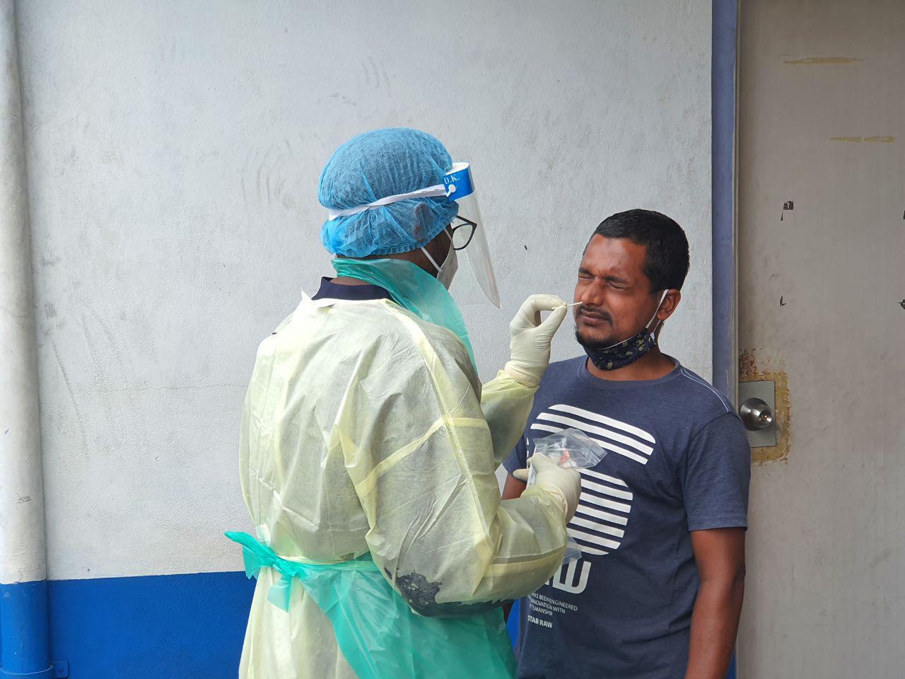 Frontline worker taking a test sample for Covid-19