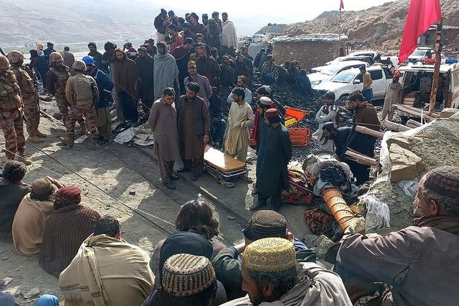 Miners gathered outside the collapsed mine as rescue personnel conducted a search operation for trapped workers. (AFP PHOTO/MINES AND MINERALS DEVELOPMENT DEPARTMENT BALOCHISTAN)