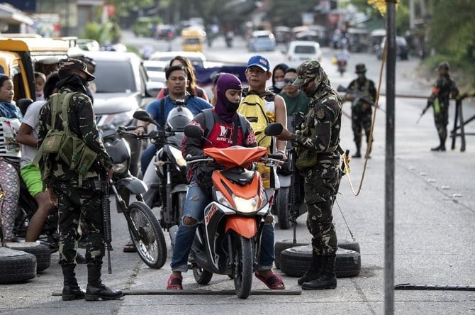 The military and police have been working with the bus owners to capture the extortionists. (AFP file photo)