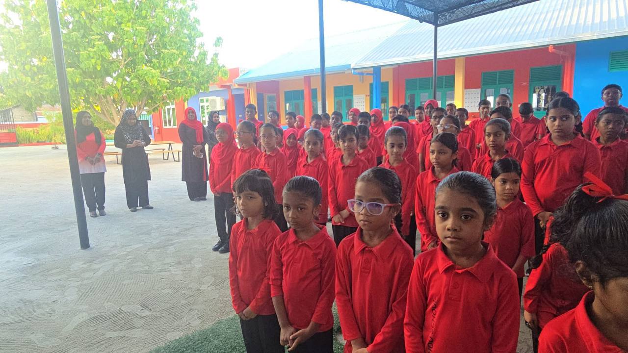 School students in a school assembly.