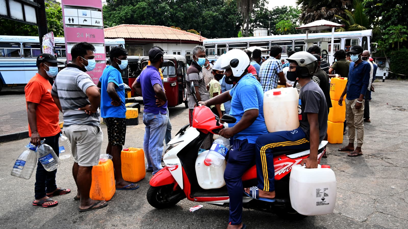 People stand in a queue to buy diesel fuel at a petrol station in Colombo, Sri Lanka on March 3, 2022. Photo: AFP | Getty Images