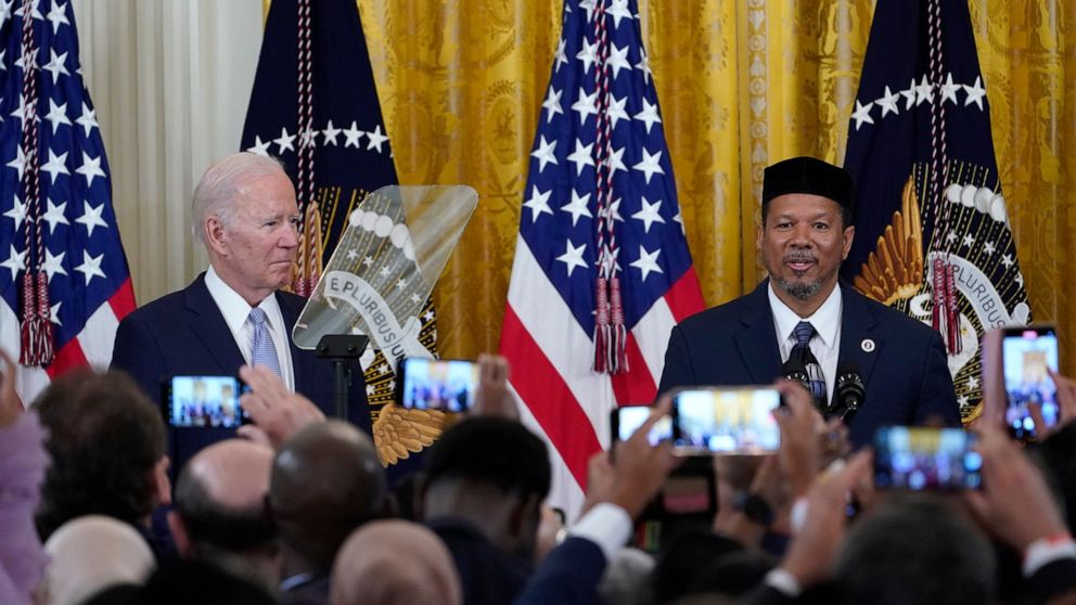 President Joe Biden, along with Talib M. Shareef, (right), President and Imam of the historic, Nation's Mosque, Masjid Muhammad in Washington.