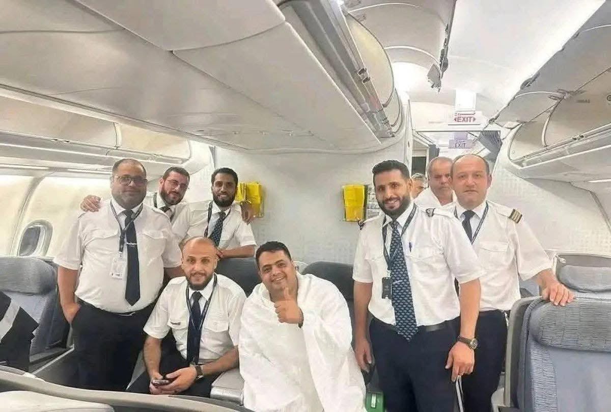 Amer with the crew of his flight