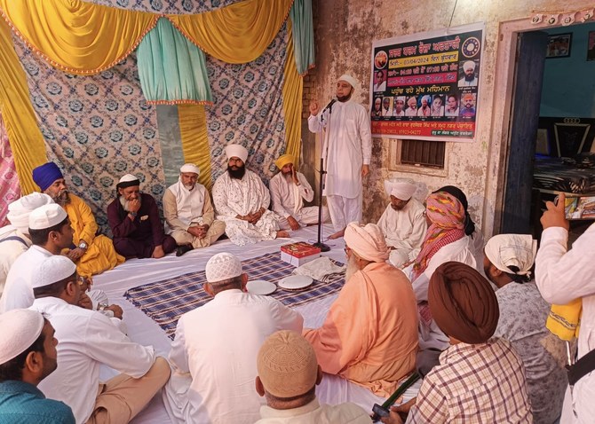 Sikhs, Muslims and Hindus gather for an iftar hosted by a gurdwara in Malerkotla, Punjab, on April 3, 2024. (Sikh-Muslim Sanjha Foundation)